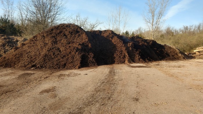 A large pile of the mulch that is available for free.